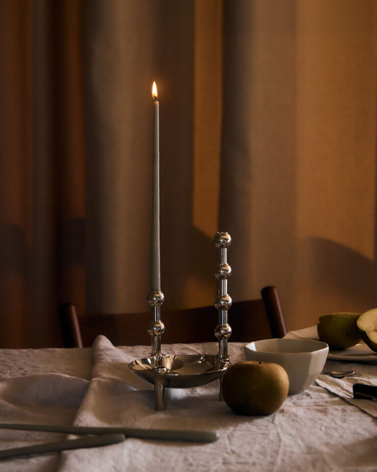 bowl_vase-in-chrome-and-taper-candles-in-artichoke