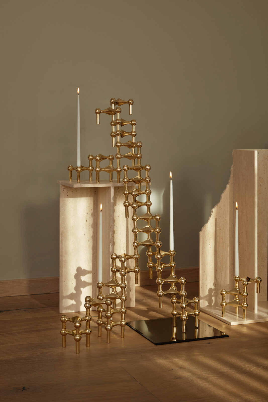 stoff nagel brass sculpture with taper candles