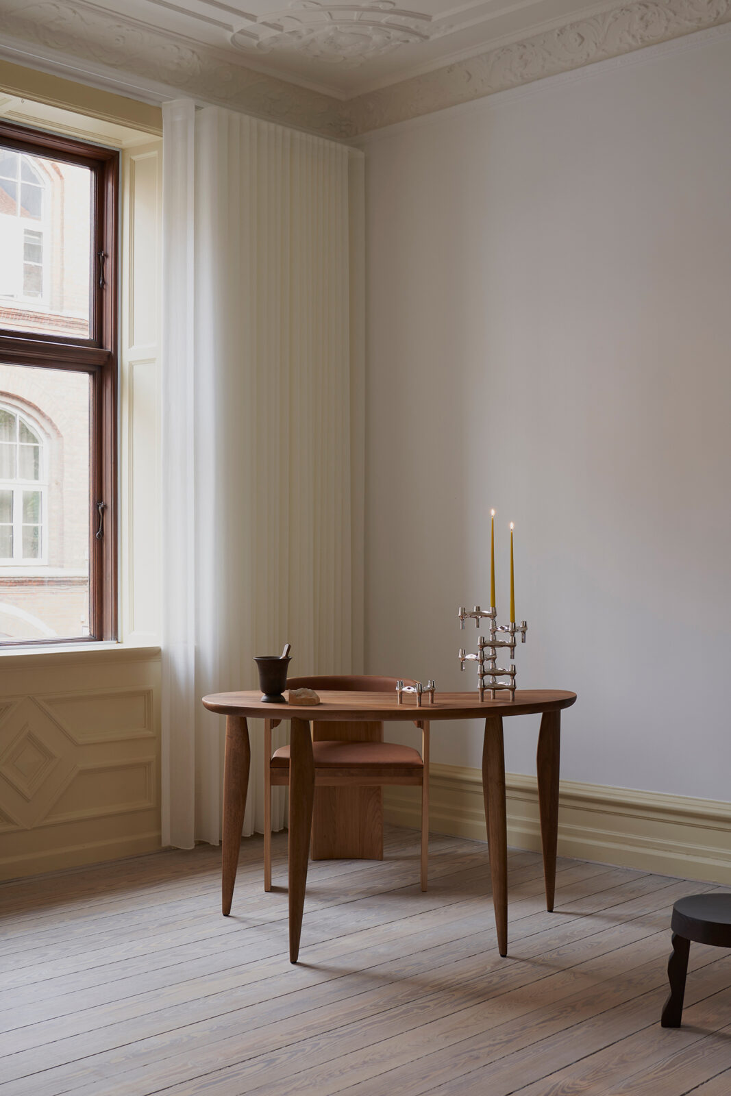 BMF candle holders by stoff nagel and taper candles in mustard