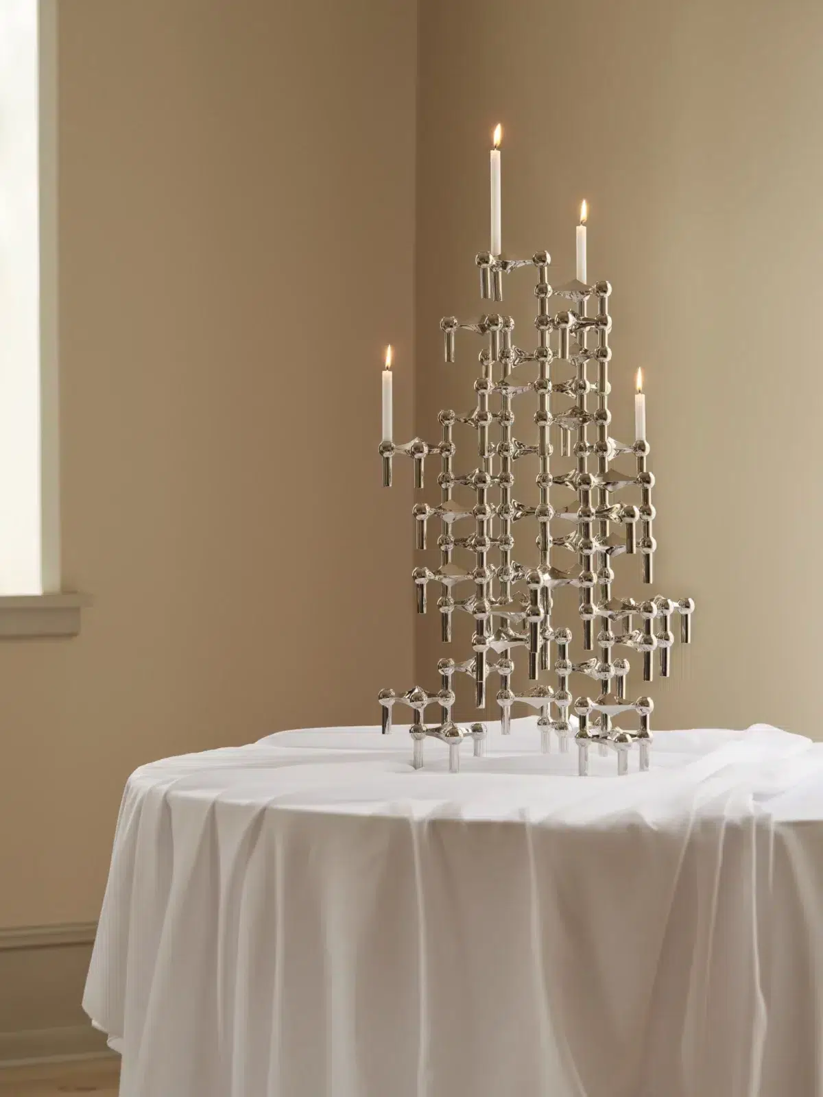 nagel candle holder sculpture in chrome