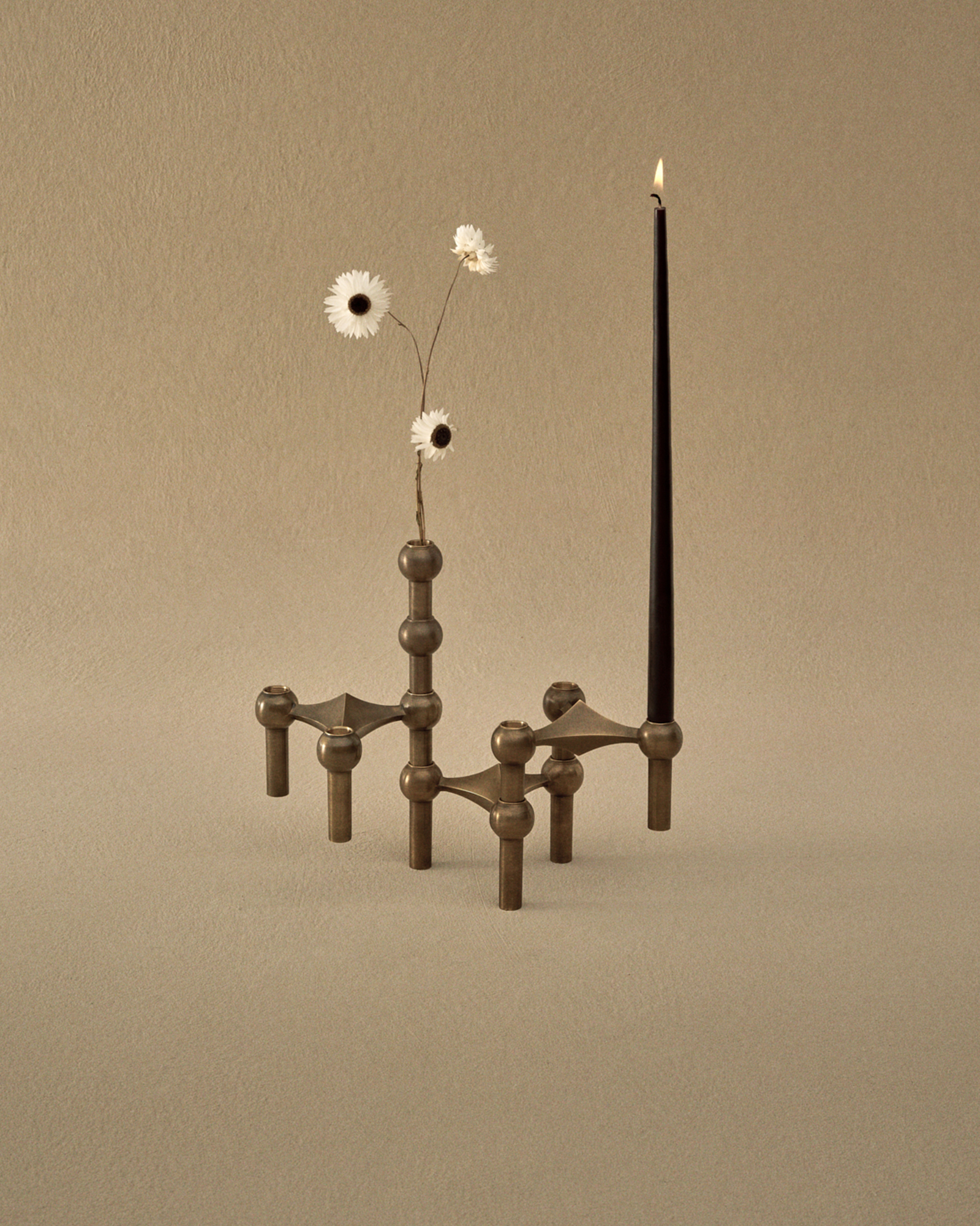 stoff nagel candle holders and vase in bronzed brass