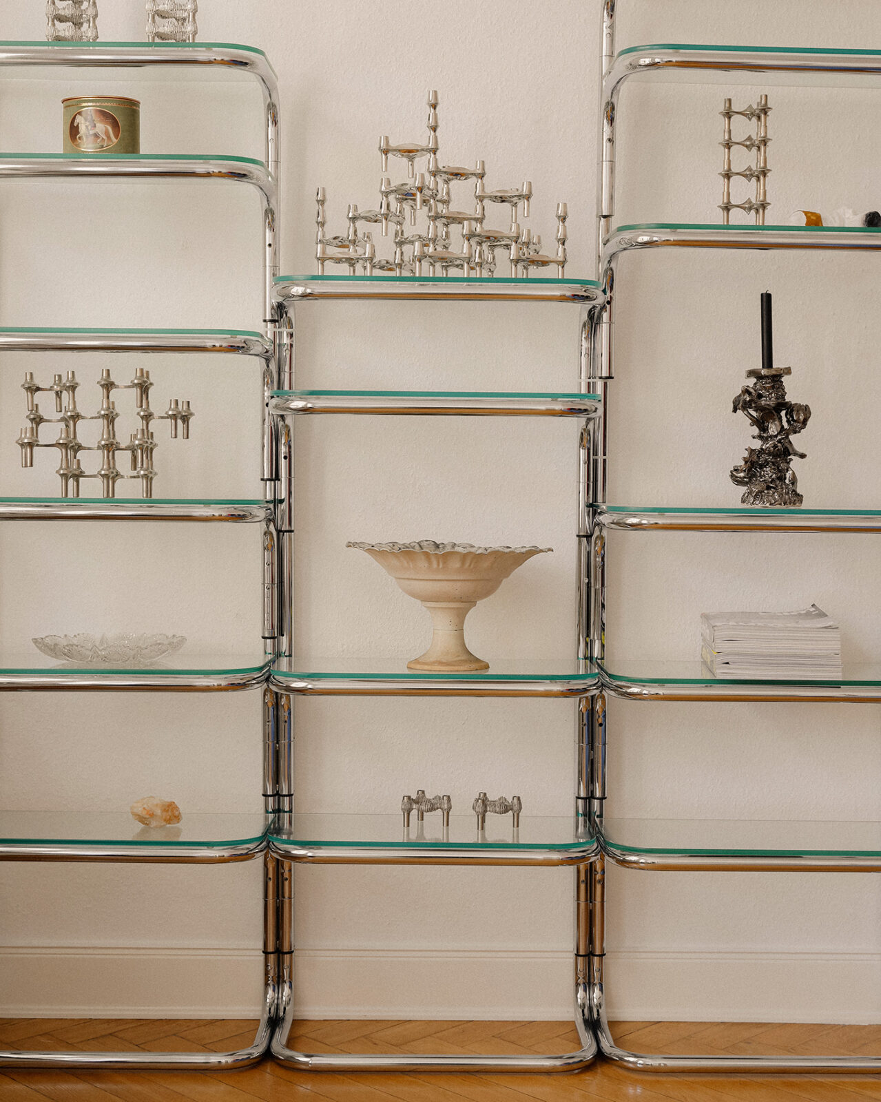 At home with Linda Kaeckermann, founder of Ain't No Trash. A shelf with STOFF Nagel candle holders - both antique and relaunched editions.