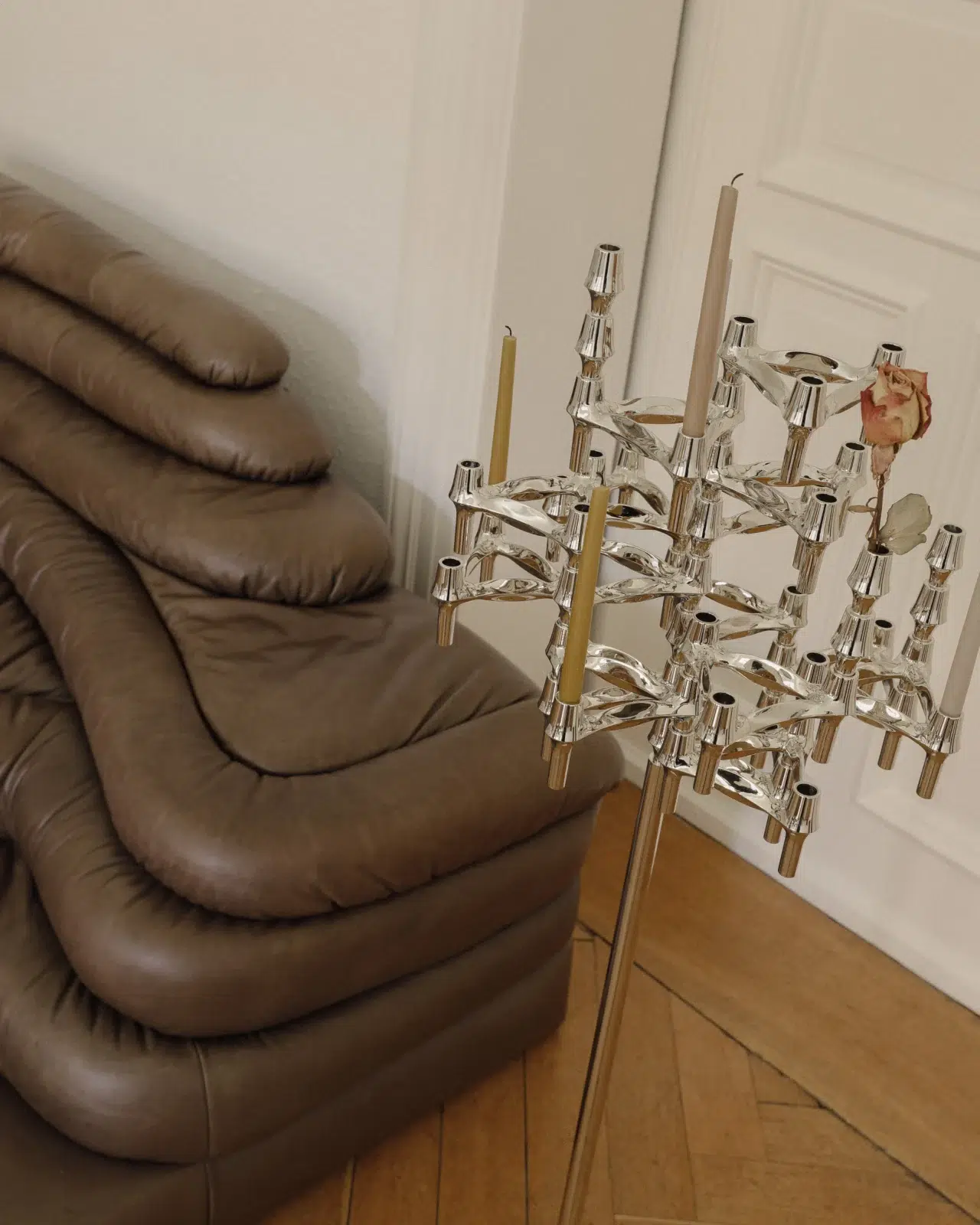 Linda Käckermann for STOFF Nagel at home showing the STOFF Nagel floor stand with the BMF candle holders and vases in chrome.