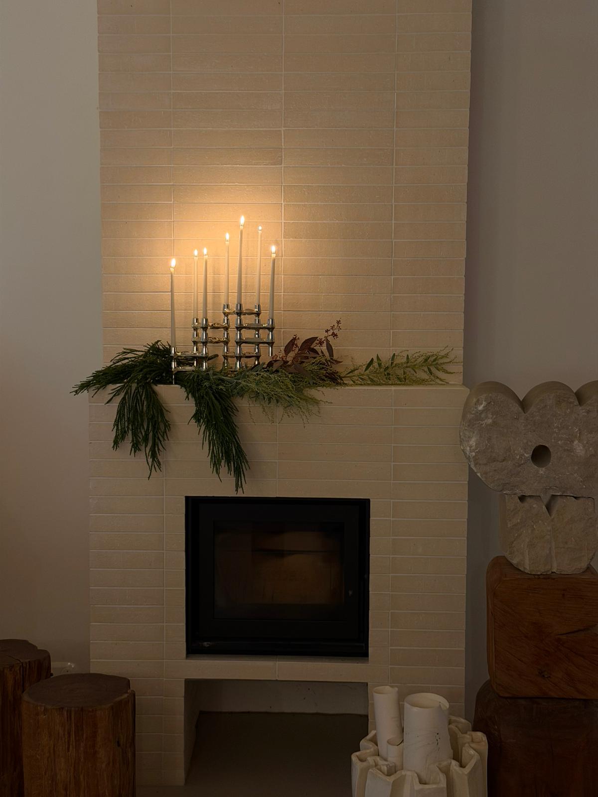 stoff nagel bmf candle holders in chrome in a cozy christmas setting