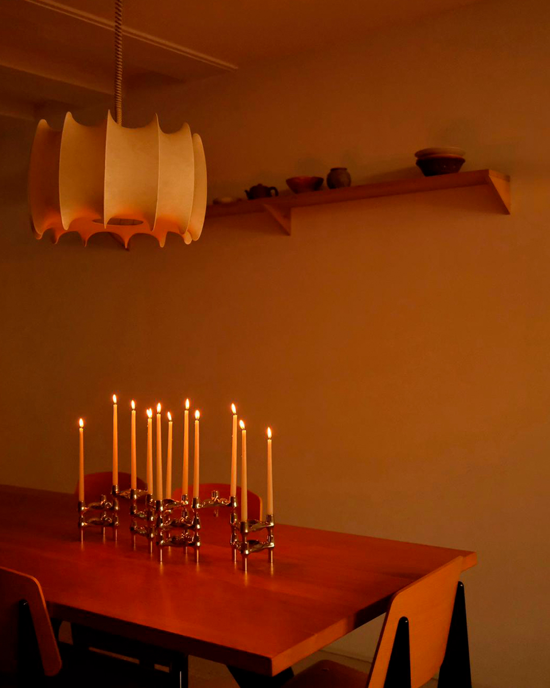 stoff nagel bmf candle holders set on a table with lots of lit candles - the perfect christmas mood