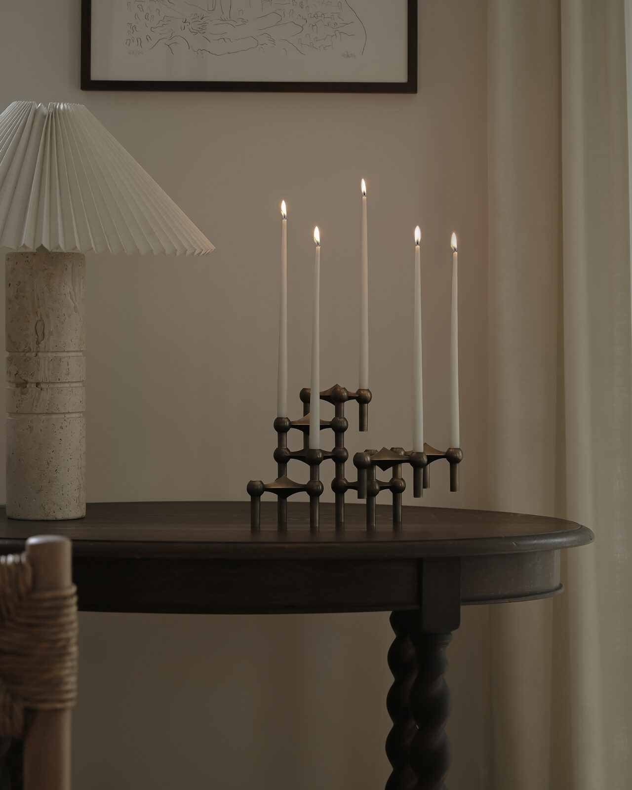 the Nagel candle holders in bronzed brass by michiel bosman