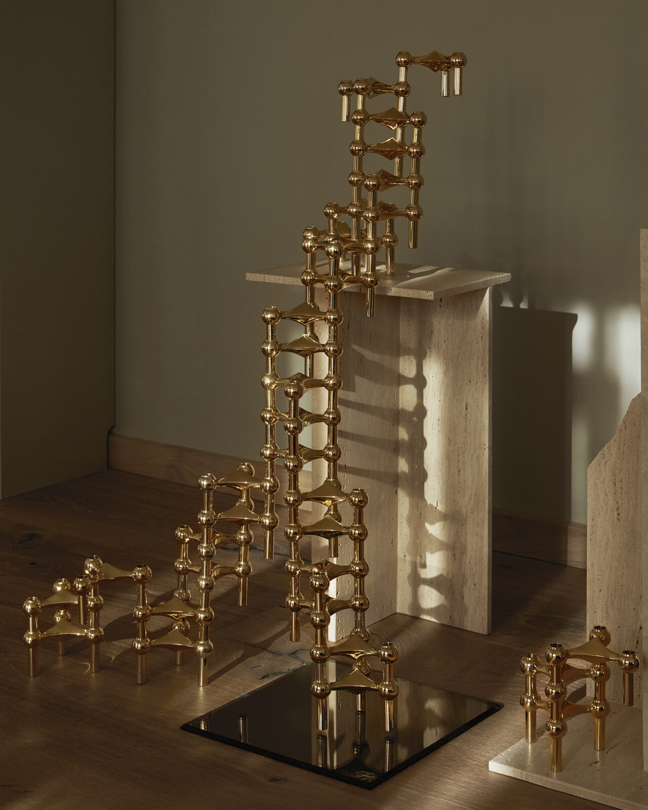 stoff nagel candle holders in solid brass in a big sculptural formation.