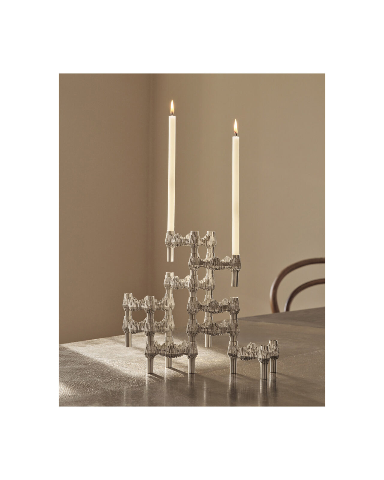 quist candle holders with candles in cream