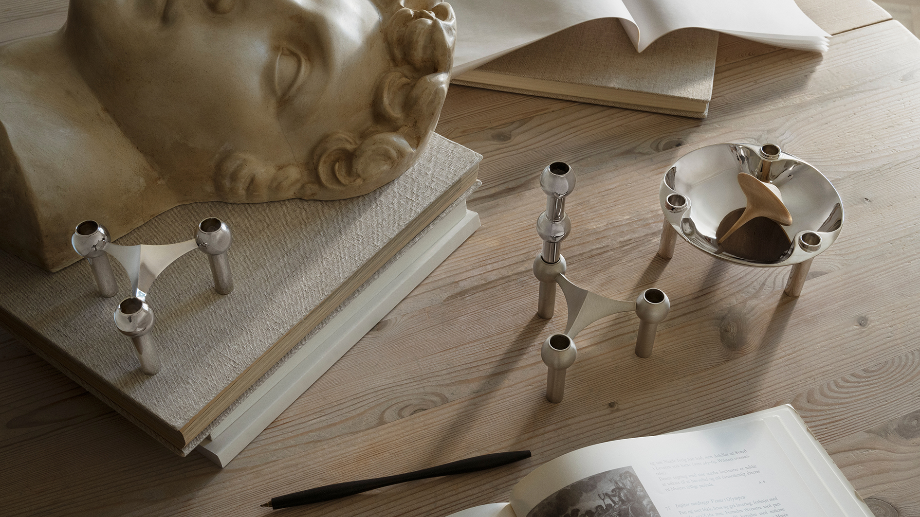 stoff nagel chrome collection. an iconic candle holder