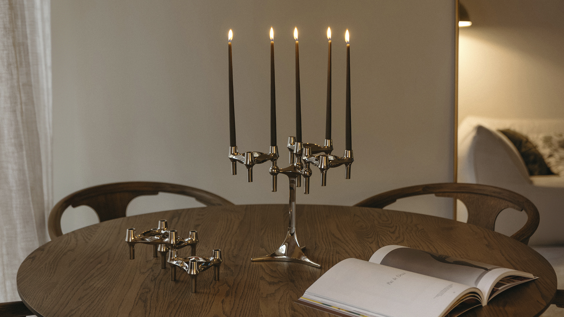 stoff nagel stand and bmf candle holders in lit taper candles